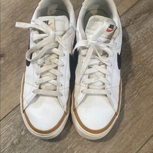 Nike White Sneakers with Black Swoosh